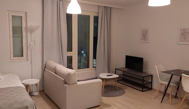Top location studio in town right next to the train station and free parking Kotimaailma Apartments