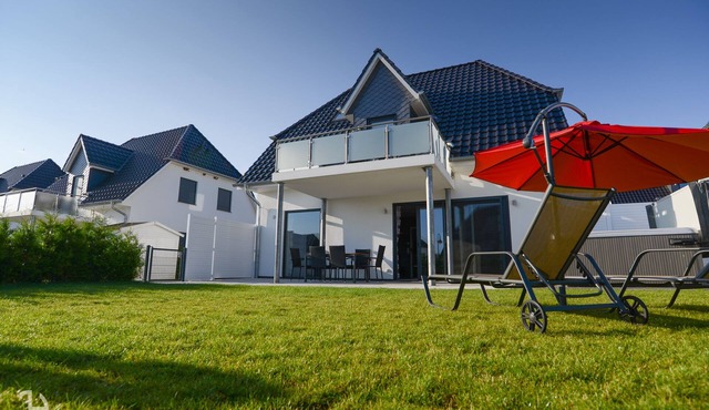 Villa Fleesenstrand am See | with outdoor whirlpool | Sky TV | Fireplace | sauna