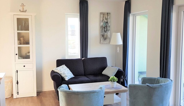 Well-kept vacation apartment with sauna directly behind the dike