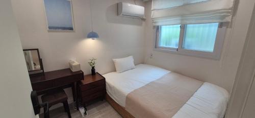 Single Bed in Female Dormitory Room