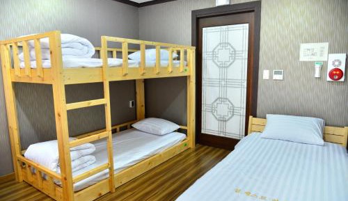Single Bed in Dormitory Room