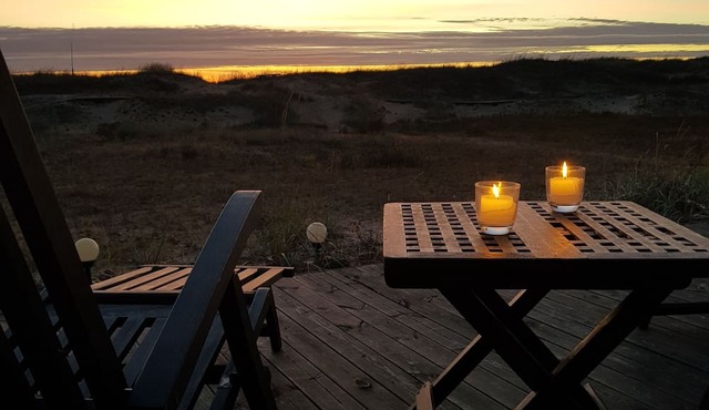 Small beach house by the sea with an amazing view from the balcony. nnn